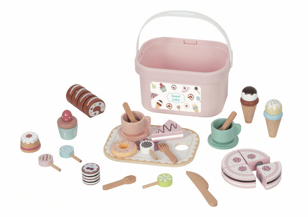 Tea set with desserts in a bucket