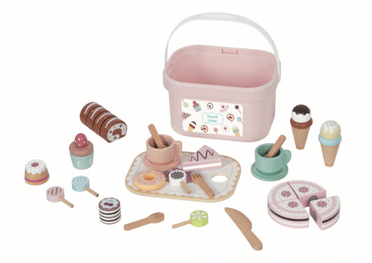 Tea set with desserts in a bucket